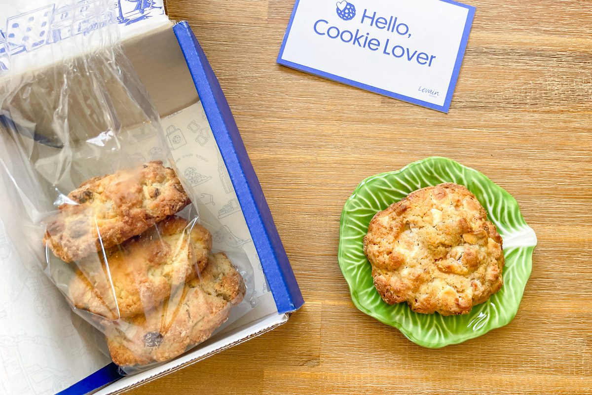 Levain Carrot Cake Cookies in box next to one cookie on a small plate