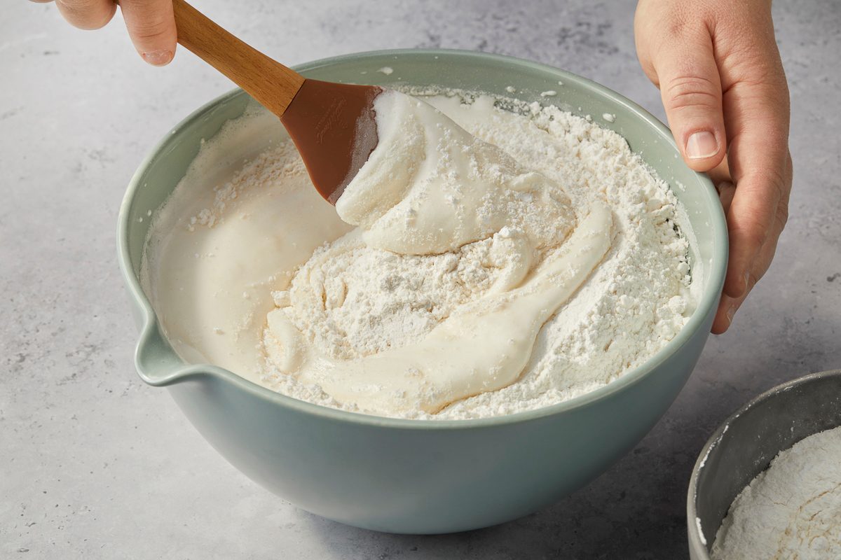 folding in sugar and flour in with meringue mixture