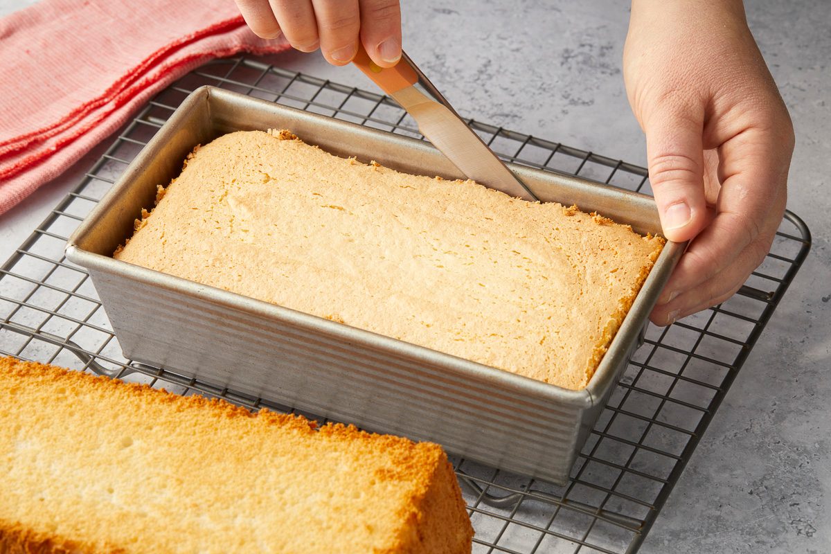 running a knife around the sides of the loaf pan