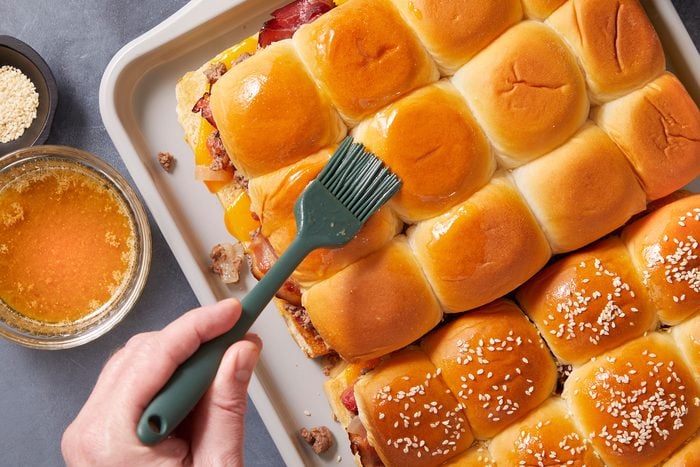 Glazing the rolls with a mixture of butter, brown sugar, Worcestershire sauce and mustard melted in microwave.