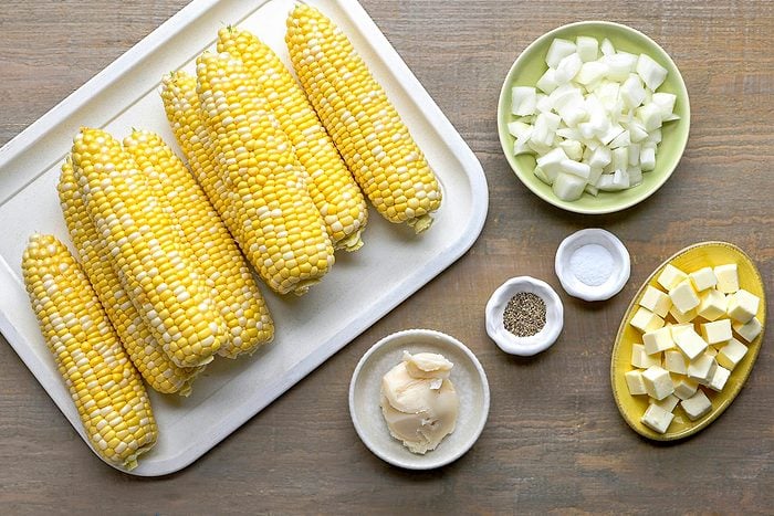 sweet corn, butter, bacon grease, onion, salt and ground pepper
