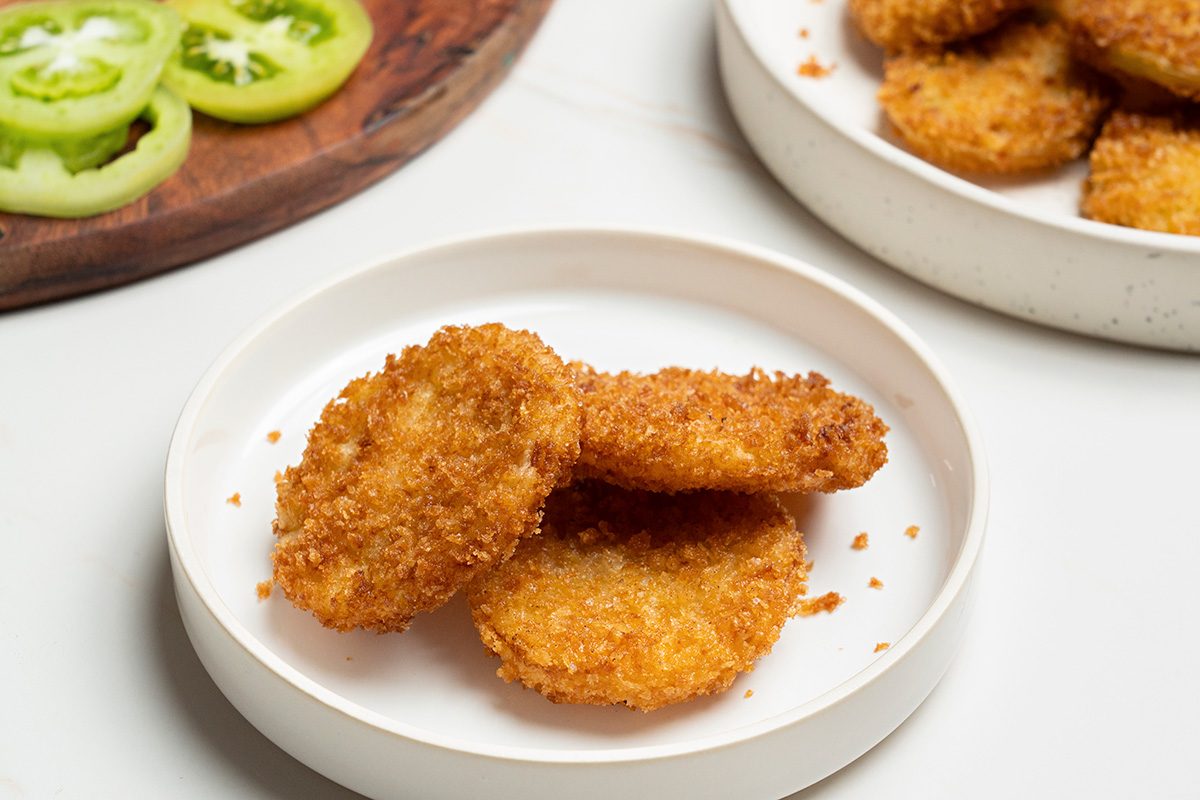 Overhead shot of Panko Fried Green Tomatoes, sprinkled with salt