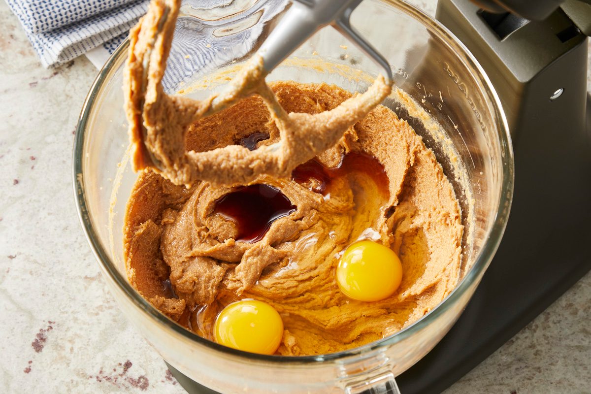 beating eggs in with peanut butter mixture