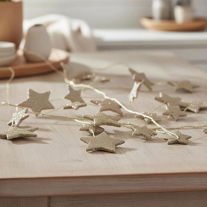 The My Texas House Summer Collection Glitter Star Garland Via Walmart.com