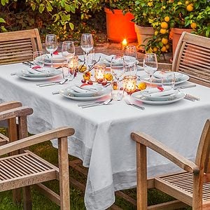 Autumnal laid table in garden in the evening