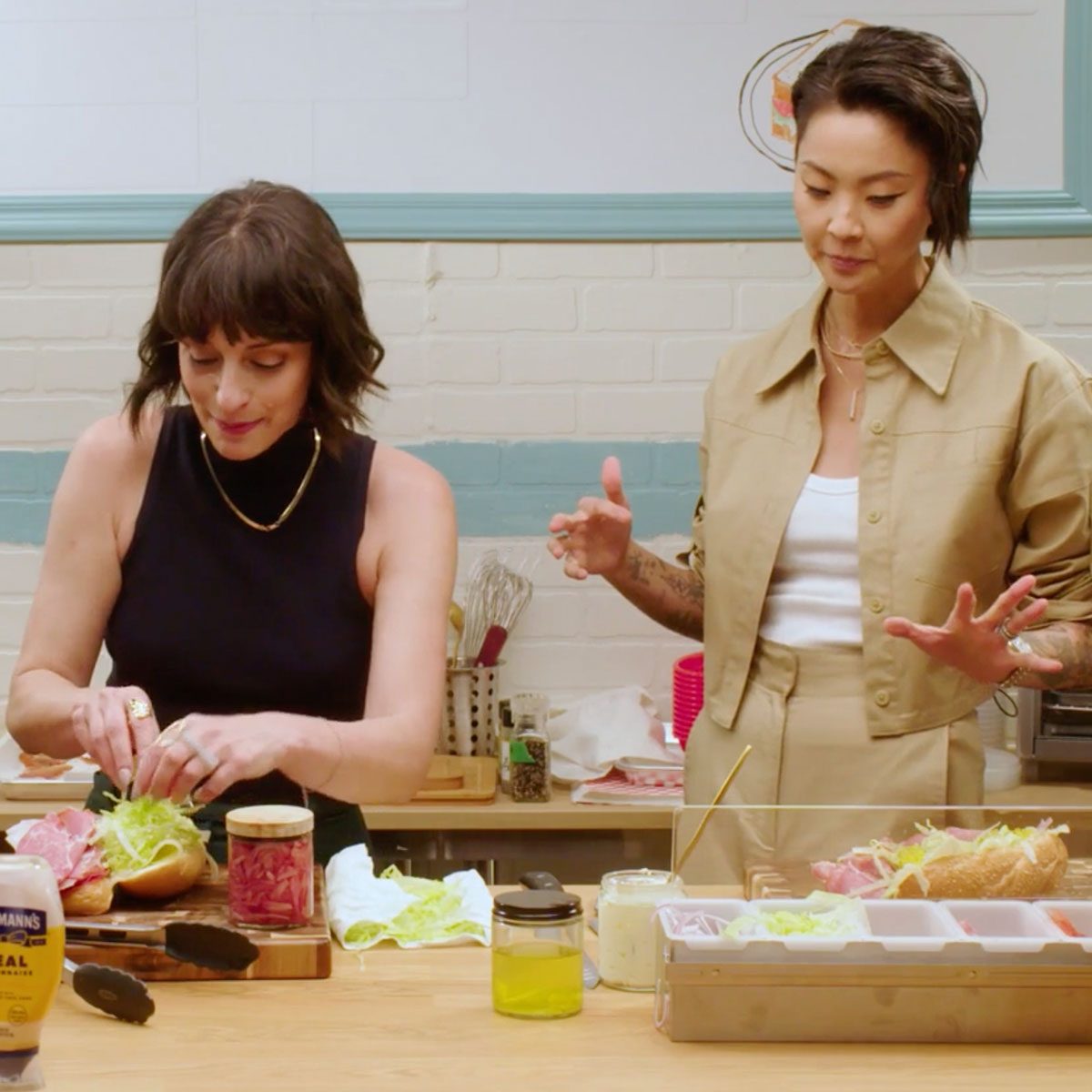 Lindsay Ames and Kristen Kish on The Great American Sandwich Show making italian sandwiches