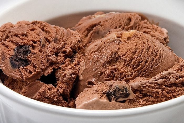 close up of chocolate ice cream with cookie chunks