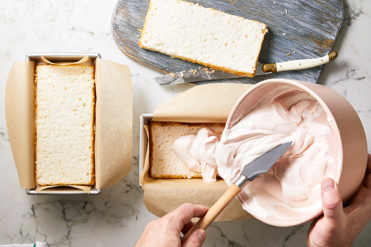 ice cream mixture being transferred onto a cake loaf layer
