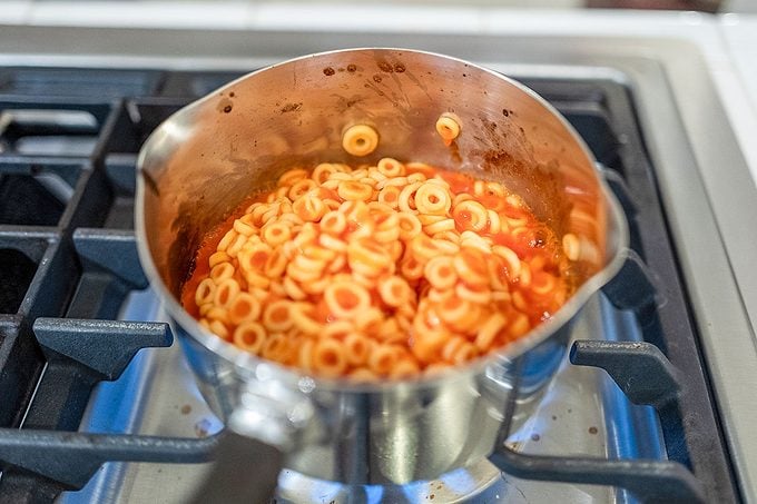 Close-up of Spaghettio pasta cooking in a pot on a stovetop in Lafayette, California