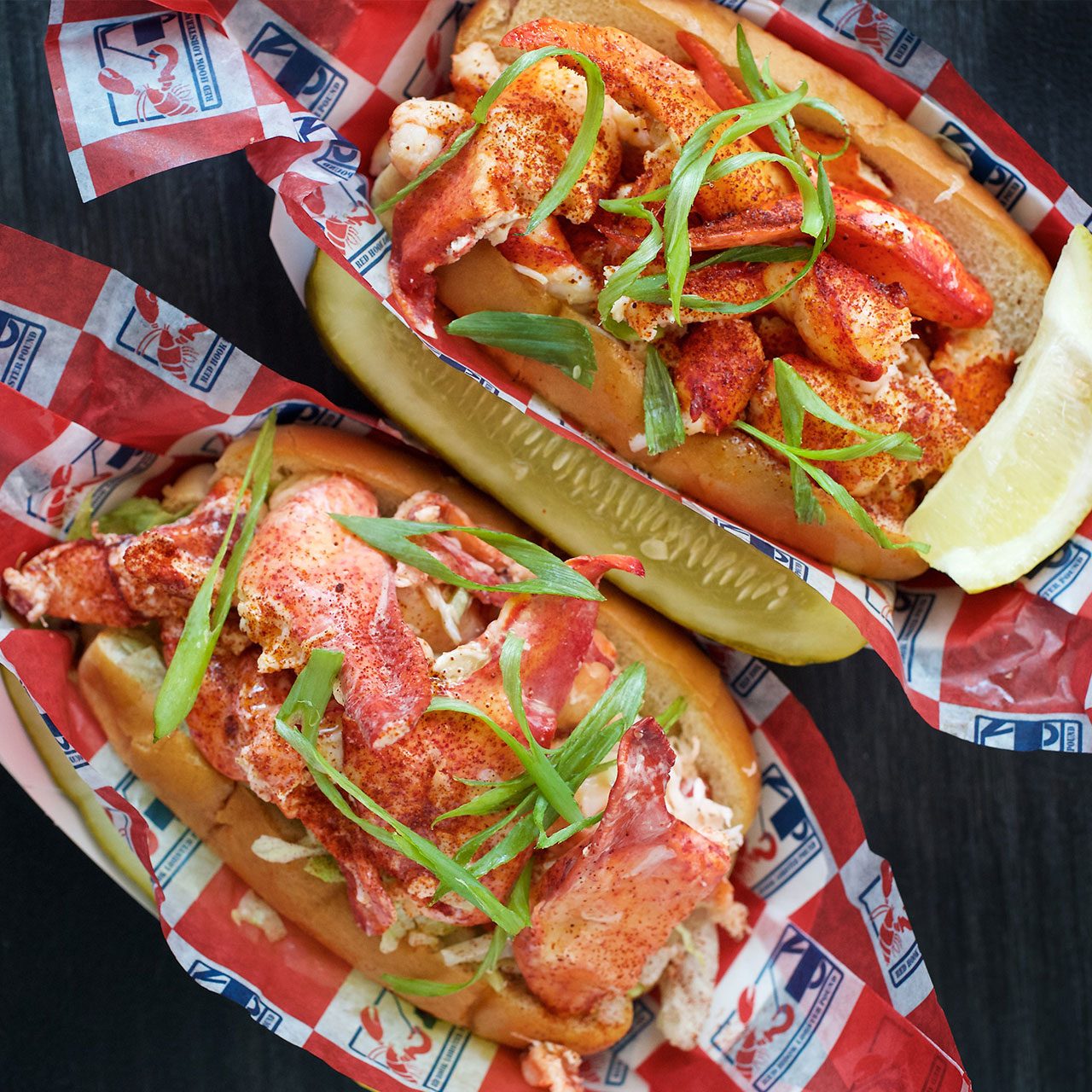 Maine And Connecticut Lobster Roll Gettyimages 699539350