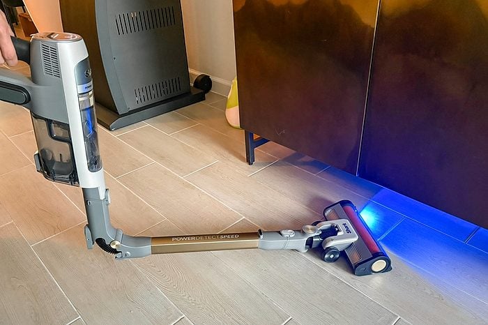 Shark Powerdetect Speed Clean & Empty vacuum cleaner bent in the middle with blue light on