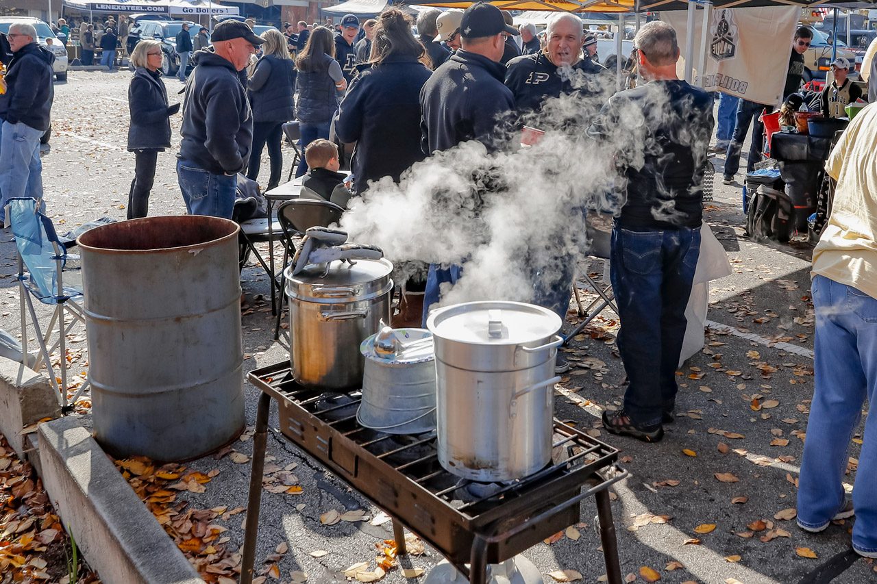 fans tailgating in stadium parking lot